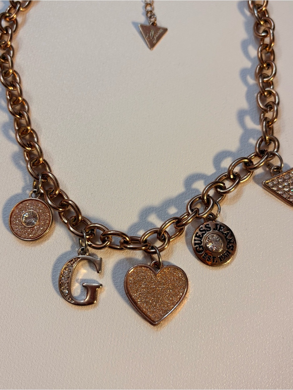 GUESS Rose Gold Charm Necklace with rhinestones